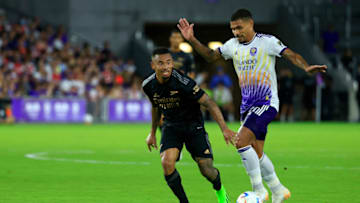 ORLANDO, FLORIDA - JULY 20: Gabriel Jesus #9 of Arsenal and Facundo Torres #17 of Orlando City fight for the ballduring a Florida Cup friendly at Exploria Stadium on July 20, 2022 in Orlando, Florida. (Photo by Mike Ehrmann/Getty Images)