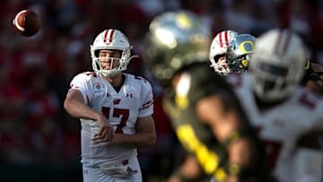 PASADENA, CALIFORNIA - JANUARY 01: Jack Coan #17 of the Wisconsin Badgers throws a pass against the Oregon Ducks during the first half in the Rose Bowl game presented by Northwestern Mutual at Rose Bowl on January 01, 2020 in Pasadena, California. (Photo by Sean M. Haffey/Getty Images)
