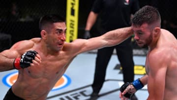 LAS VEGAS, NEVADA - AUGUST 29: (L-R) Ricardo Lamas punches Bill Algeo in their featherweight fight during the UFC Fight Night event at UFC APEX on August 29, 2020 in Las Vegas, Nevada. (Photo by Jeff Bottari/Zuffa LLC)