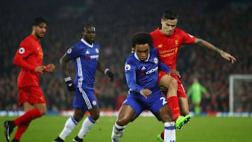 LIVERPOOL, ENGLAND - JANUARY 31: Willian of Chelsea is tackled by Philippe Coutinho of Liverpool during the Premier League match between Liverpool and Chelsea at Anfield on January 31, 2017 in Liverpool, England. (Photo by Clive Mason/Getty Images)