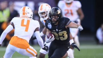 Dec 30, 2021; Nashville, TN, USA; Purdue Boilermakers wide receiver Jackson Anthrop (33) runs a s Tennessee Volunteers defensive back Warren Burrell (4) chases during the first half at Nissan Stadium. Mandatory Credit: Steve Roberts-USA TODAY Sports