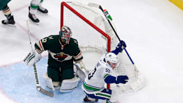 EDMONTON, ALBERTA - AUGUST 07: Bo Horvat #53 of the Vancouver Canucks celebrates after scoring a goal past Alex Stalock #32 of the Minnesota Wild during the third period in Game Four of the Western Conference Qualification Round prior to the 2020 NHL Stanley Cup Playoffs at Rogers Place on August 07, 2020 in Edmonton, Alberta. (Photo by Jeff Vinnick/Getty Images)