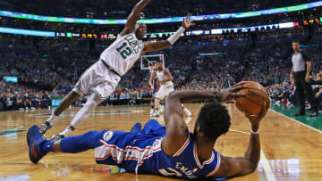BOSTON - MAY 9: Boston Celtics' Terry Rozier III leaps to try and block a pass from the 76ers' Joel Embiid during the first half. The Boston Celtics host the Philadelphia 76ers in Game Five of the NBA Eastern Conference Semi Final playoff series at TD Garden in Boston on May 9, 2018. (Photo by Jim Davis/The Boston Globe via Getty Images)