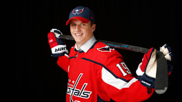 VANCOUVER, BRITISH COLUMBIA - JUNE 22: Aliaksei Protas reacts after being selected 91st overall by the Washington Capitals during the 2019 NHL Draft at Rogers Arena on June 22, 2019 in Vancouver, Canada. (Photo by Kevin Light/Getty Images)