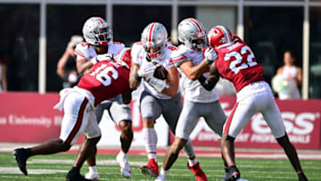 Sep 2, 2023; Bloomington, Indiana, USA; Ohio State Buckeyes tight end Cade Stover (8) runs past Indiana Hoosiers defensive back Jordan Grier (16) during the second half at Memorial Stadium. Mandatory Credit: Marc Lebryk-USA TODAY Sports
