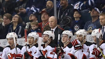 Jan 23, 2016; Winnipeg, Manitoba, CAN; New Jersey Devils head coach John Hynes looks on during the first period against the Winnipeg Jets at MTS Centre. Mandatory Credit: Bruce Fedyck-USA TODAY Sports