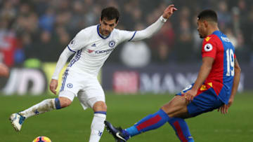 LONDON, ENGLAND - DECEMBER 17: Cesc Fabregas of Chelsea (L) attempts to take the ball past Zeki Fryers of Crystal Palace (R) during the Premier League match between Crystal Palace and Chelsea at Selhurst Park on December 17, 2016 in London, England. (Photo by Clive Rose/Getty Images)