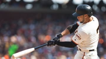 Apr 24, 2016; San Francisco, CA, USA; San Francisco Giants center fielder Gregor Blanco (7) hits a single against the Miami Marlins during the eighth inning at AT&T Park. Mandatory Credit: Kelley L Cox-USA TODAY Sports