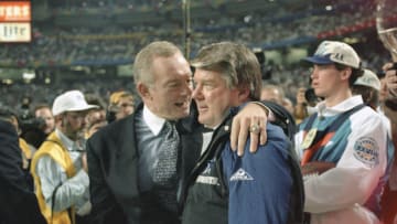 ATLANTA, GA - JANUARY 30: Owner Jerry Jones of the Dallas Cowboys (L) hugs head coach Jimmy Johnson (R) as the Cowboys leads the Buffalo Bills late in the fourth quarter of Super Bowl XXVIII on January 30, 1994 at the Georgia Dome in Atlanta, Georgia. The Cowboys won the Super Bowl 30 -13. (Photo by Focus on Sport/Getty Images)