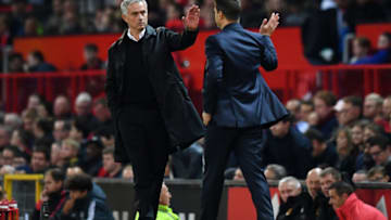 MANCHESTER, ENGLAND - AUGUST 27: Jose Mourinho, Manager of Manchester United and Mauricio Pochettino, Manager of Tottenham Hotspur give each other a high five after the Premier League match between Manchester United and Tottenham Hotspur at Old Trafford on August 27, 2018 in Manchester, United Kingdom. (Photo by Michael Regan/Getty Images)