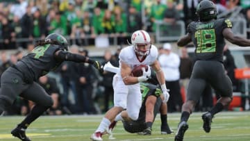 Nov 12, 2016; Eugene, OR, USA; Stanford Cardinal quarterback Keller Chryst (10) runs the ball in the second quarter as Oregon Ducks linebacker Jimmie Swain (18) and Oregon Ducks defensive back Ugo Amadi (14) at Autzen Stadium. Mandatory Credit: Scott Olmos-USA TODAY Sports