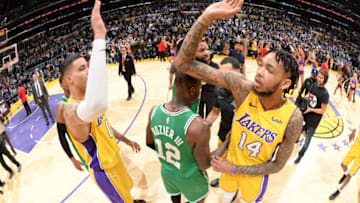 LOS ANGELES, CA - JANUARY 23: Kyle Kuzma #0 and Brandon Ingram #14 of the Los Angeles Lakers exchange high fives after the game against the Boston Celtics on January 23, 2018 at STAPLES Center in Los Angeles, California. NOTE TO USER: User expressly acknowledges and agrees that, by downloading and/or using this Photograph, user is consenting to the terms and conditions of the Getty Images License Agreement. Mandatory Copyright Notice: Copyright 2018 NBAE (Photo by Andrew D. Bernstein/NBAE via Getty Images)