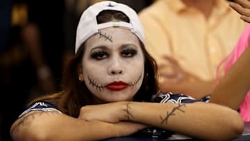 ARLINGTON, TX - OCTOBER 31: A fan of the Dallas Cowboys looks on dejected against the Jacksonville Jaguars at Cowboys Stadium on October 31, 2010 in Arlington, Texas. (Photo by Stephen Dunn/Getty Images)