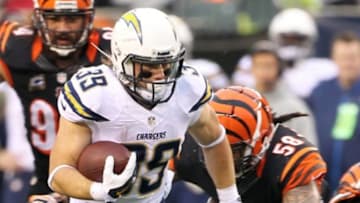 Jan 5, 2014; Cincinnati, OH, USA; San Diego Chargers running back Danny Woodhead (39) runs the ball during the third quarter against the Cincinnati Bengals during the AFC wild card playoff football game at Paul Brown Stadium. Mandatory Credit: Pat Lovell-USA TODAY Sports