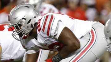 Sep 7, 2015; Blacksburg, VA, USA; Ohio State Buckeyes defensive lineman Adolphus Washington (92) lines up against the Virginia Tech Hokies at Lane Stadium. Mandatory Credit: Geoff Burke-USA TODAY Sports