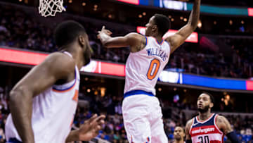 WASHINGTON, DC - MARCH 25: Troy Williams #0 of the New York Knicks dunks against the Washington Wizards during the first half at Capital One Arena on March 25, 2018 in Washington, DC. (Photo by Scott Taetsch/Getty Images)