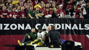 Jan 16, 2016; Glendale, AZ, USA; Green Bay Packers wide receiver Randall Cobb (18) is carted off the field during the first half in a NFC Divisional round playoff game against the Arizona Cardinals at University of Phoenix Stadium. Mandatory Credit: Matt Kartozian-USA TODAY Sports
