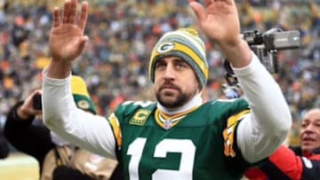 Jan 11, 2015; Green Bay, WI, USA; Green Bay Packers quarterback Aaron Rodgers (12) waves to the crowd after the 2014 NFC Divisional playoff football game against the Dallas Cowboys at Lambeau Field. Mandatory Credit: Andrew Weber-USA TODAY Sports