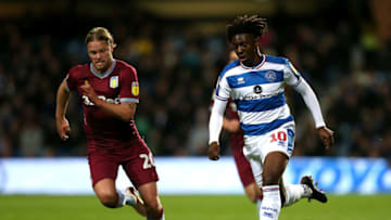 LONDON, ENGLAND - OCTOBER 26: Eberchi Eze of QPR is closed down by Birkir Bjarnason of Aston Villa during the Sky Bet Championship match between Queens Park Rangers and Aston Villa at Loftus Road on October 26, 2018 in London, England. (Photo by Alex Pantling/Getty Images)
