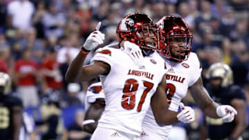 INDIANAPOLIS, IN - SEPTEMBER 02: Dez Fitzpatrick #87 and Jaylen Smith #9 of the Louisville Cardinals celebrate after Fitzpatrick caught a touchdown pass during the game against the Purdue Boilermakers at Lucas Oil Stadium on September 2, 2017 in Indianapolis, Indiana. (Photo by Andy Lyons/Getty Images)