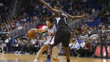 Feb 5, 2016; Orlando, FL, USA; Orlando Magic guard Evan Fournier (10) drives around Los Angeles Clippers forward Lance Stephenson (1) during the first quarter of a basketball game at Amway Center. Mandatory Credit: Reinhold Matay-USA TODAY Sports