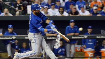 Sep 30, 2015; Baltimore, MD, USA; Toronto Blue Jays right fielder Jose Bautista (19) hits a solo home run in the ninth inning against the Baltimore Orioles at Oriole Park at Camden Yards. Toronto Blue Jays defeated Baltimore Orioles 15-2 and clinched the A.L. East division. Mandatory Credit: Tommy Gilligan-USA TODAY Sports