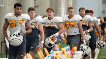 Tennessee tight ends, from left, Jacob Warren (87), Sean Brown (83), Austin Pope (81), Jackson Lowe (82), and Andrew Craig (86) line up to sign autographs for fans during Tennessee Fan Day on Sunday, August 4, 2019.Kns Vols Mediaday