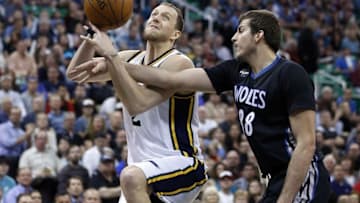 Apr 1, 2016; Salt Lake City, UT, USA; Utah Jazz forward Joe Ingles (2) is fouled by Minnesota Timberwolves forward Nemanja Bjelica (88) in the third quarter at Vivint Smart Home Arena. The Utah Jazz defeated the Minnesota Timberwolves 98-85. Mandatory Credit: Jeff Swinger-USA TODAY Sports