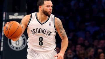 May 10, 2014; Brooklyn, NY, USA; Brooklyn Nets guard Deron Williams (8) advances the ball during the fourth quarter against the Miami Heat in game three of the second round of the 2014 NBA Playoffs at Barclays Center. Brooklyn Nets won 104-90. Mandatory Credit: Anthony Gruppuso-USA TODAY Sports