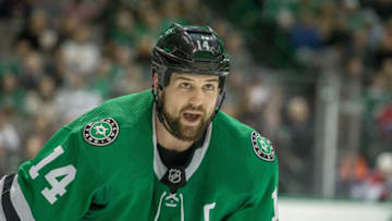 DALLAS, TX - DECEMBER 31: Dallas Stars left wing Jamie Benn (14) waits for the puck to drop during the game between the Dallas Stars and the Montreal Canadiens on December 31, 2018 at the American Airlines Center in Dallas, Texas. (Photo by Matthew Pearce/Icon Sportswire via Getty Images)