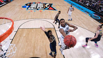 SAN ANTONIO, TX - APRIL 02: Mikal Bridges #25 of the Villanova Wildcats shoots the ball against the Michigan Wolverines in the 2018 NCAA Men's Final Four National Championship game at the Alamodome on April 2, 2018 in San Antonio, Texas. (Photo by Jamie Schwaberow/NCAA Photos via Getty Images)