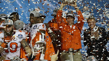 ORLANDO, FL - DECEMBER 03: Head coach Dabo Swinney of the Clemson Tigers holds the chammpionship trophy following the ACC Championship game against the Virginia Tech Hokies on December 3, 2016 in Orlando, Florida. The Clemson Tigers won the game 42-35. (Photo by Sam Greenwood/Getty Images)
