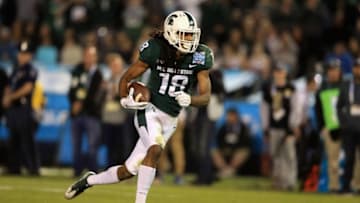 SAN DIEGO, CA - DECEMBER 28: Felton Davis III #18 of the Michigan State Spartans runs in a touchdown on a pass play against the Washington State Cougars during the first half of the SDCCU Holiday Bowl at SDCCU Stadium on December 28, 2017 in San Diego, California. (Photo by Sean M. Haffey/Getty Images)