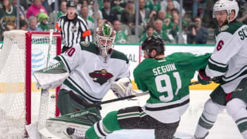 Apr 16, 2016; Dallas, TX, USA; Minnesota Wild defenseman Marco Scandella (6) takes down Dallas Stars center Tyler Seguin (91) in front of goalie Devan Dubnyk (40) during the second period of game two of the first round of the 2016 Stanley Cup Playoffs at the American Airlines Center. Mandatory Credit: Jerome Miron-USA TODAY Sports