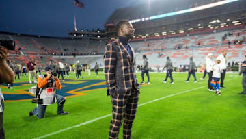 Auburn football interim head coach Carnell "Cadillac" Williams walks the field before Auburn Tigers take on Texas A&M at Jordan-Hare Stadium in Auburn, Ala., on Saturday, Nov. 12, 2022.