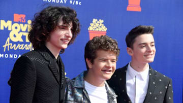 SANTA MONICA, CALIFORNIA - JUNE 15: (L-R) Finn Wolfhard, Gaten Matarazzo, and Noah Schnapp attend the 2019 MTV Movie and TV Awards at Barker Hangar on June 15, 2019 in Santa Monica, California. (Photo by Frazer Harrison/Getty Images for MTV)