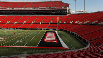 A man kicks a football towards the goalposts as media tours Cardinal Stadium Wednesday afternoon. Athletic director Vince Tyra said school will use artificial crowd noise for the upcoming Cardinal football game against Western Kentucky this Saturday. Around 1,200 students will be allowed to attend the game, with around 12,000 fans to be admitted. Sept. 9, 2020Cardinal Stadiums Plans To Reopen For Uofl Football Amid Covid 19