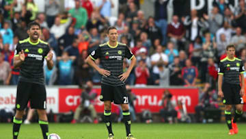 SWANSEA, WALES - SEPTEMBER 11: (L-R) Diego Costa, Nemanja Matic and Cesar Azpilicueta of Chelsea look dejected during the Premier League match between Swansea City and Chelsea at Liberty Stadium on September 11, 2016 in Swansea, Wales. (Photo by Alex Livesey/Getty Images)