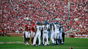 NORMAN, OK - NOVEMBER 25: The Oklahoma Sooners and West Virginia Mountaineers exchange words after a play at Gaylord Family Oklahoma Memorial Stadium on November 25, 2017 in Norman, Oklahoma. Oklahoma defeated West Virginia 59-31. (Photo by Brett Deering/Getty Images)