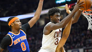 Oct 30, 2022; Cleveland, Ohio, USA; Cleveland Cavaliers guard Caris LeVert (3) reaches for a rebound beside New York Knicks forward Cam Reddish (0) in the third quarter at Rocket Mortgage FieldHouse. Mandatory Credit: David Richard-USA TODAY Sports