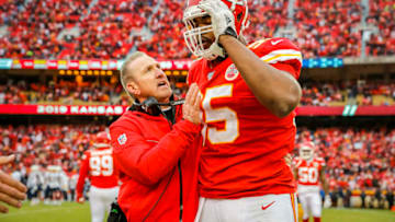 KANSAS CITY, MO - DECEMBER 29: Kansas City Chiefs defensive coordinator Steve Spagnuolo speaks with Chris Jones #95 of the Kansas City Chiefs during the fourth quarter at Arrowhead Stadium on December 29, 2019 in Kansas City, Missouri. (Photo by David Eulitt/Getty Images)