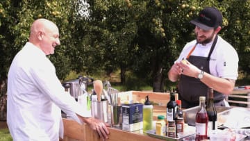 TOP CHEF -- "Thrown For a Loop" Episode 1804 -- Pictured: (l-r) Tom Colicchio, Gabe Erales -- (Photo by: David Moir/Bravo)