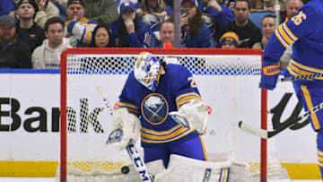 Mar 31, 2023; Buffalo, New York, USA; Buffalo Sabres goaltender Devon Levi (27) blocks a shot in the overtime period against the New York Rangers at KeyBank Center. Mandatory Credit: Mark Konezny-USA TODAY Sports
