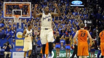 Jan 18, 2014; Lawrence, KS, USA; Kansas Jayhawks center Joel Embiid (21) celebrates after the game against the Oklahoma State Cowboys at Allen Fieldhouse. Kansas won 80-78. Mandatory Credit: John Rieger-USA TODAY Sports