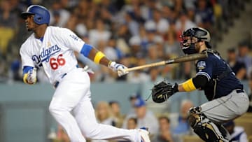 September 2, 2016; Los Angeles, CA, USA; Los Angeles Dodgers right fielder Yasiel Puig (66) at bat in the third inning against the San Diego Padres at Dodger Stadium. Mandatory Credit: Gary A. Vasquez-USA TODAY Sports