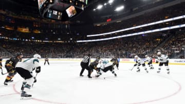 LAS VEGAS, NEVADA - SEPTEMBER 29: Cody Glass #9 of the Vegas Golden Knights faces off with Logan Couture #39 of the San Jose Sharks during the first period at T-Mobile Arena on September 29, 2019 in Las Vegas, Nevada. (Photo by David Becker/NHLI via Getty Images)