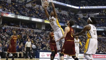 Feb 1, 2016; Indianapolis, IN, USA; Indiana Pacers center Myles Turner (27) dunks the ball past Cleveland Cavaliers forward Kevin Love (0) during the first half at Bankers Life Fieldhouse. Mandatory Credit: Brian Spurlock-USA TODAY Sports