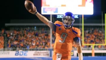 Oct 17, 2014; Boise, ID, USA; Boise State Broncos quarterback Grant Hedrick (9) scores on a touchdown pass from wide receiver Thomas Sperbeck (82) (not seen during the second half verses the Fresno State Bulldogs at Albertsons Stadium. Boise State defeated Fresno State 37-27. Mandatory Credit: Brian Losness-USA TODAY Sports