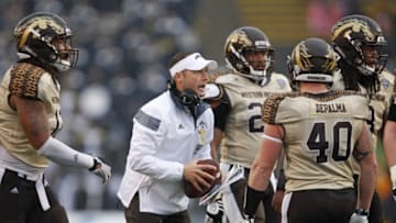 Nov 27, 2015; Toledo, OH, USA; Western Michigan Broncos head coach P.J. Fleck talks to players during the fourth quarter against the Toledo Rockets at Glass Bowl. Broncos win 35-30. Mandatory Credit: Raj Mehta-USA TODAY Sports