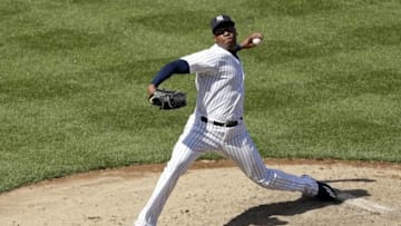 Jun 30, 2016; Bronx, NY, USA; New York Yankees relief pitcher Aroldis Chapman (54) pitches against the Texas Rangers during the ninth inning at Yankee Stadium. Yankees won 2-1. Mandatory Credit: Adam Hunger-USA TODAY Sports